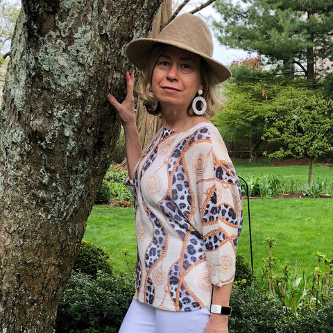 Italian Animal Print Links Top  - One Size This Italian made chenille top is a definite statement on any summer pants. Light and versatile, it will dress up your outfit.  One Size fits All  Polyester, Viscose, Elastane Blend 