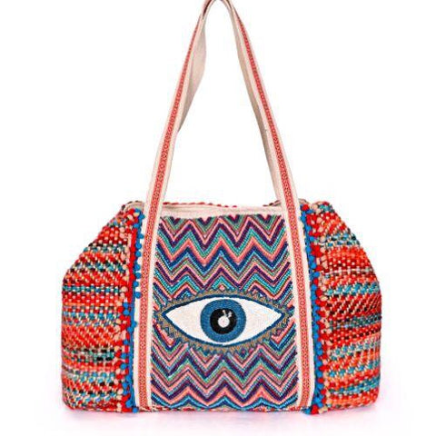 et off for a day in the sun with this beautiful weaved bag.  The Beaded Eye and the fun Tassel details make it a Eye Catcher.....