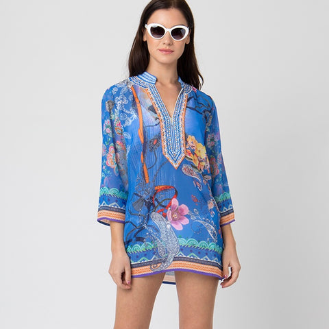 Elegant embroidered tunic by Pia Rossini. Sitting around a pool or over a white pair of pants, this tunic add colors to your outfit. Two B's Accessories