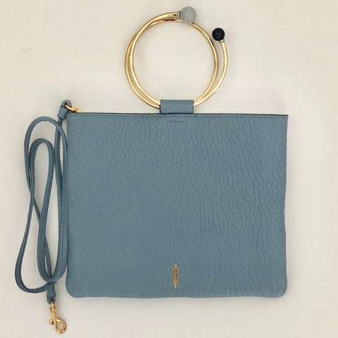 Slate Le Pouch  bubble lamb pattern leather clutch with beaded  ring handle.  Elegant and practical when our hands are needed. It has a shoulder strap and can be used as a cross body.  Italian leather  10"W x 8"H by Thacker and Two B's Accessories
